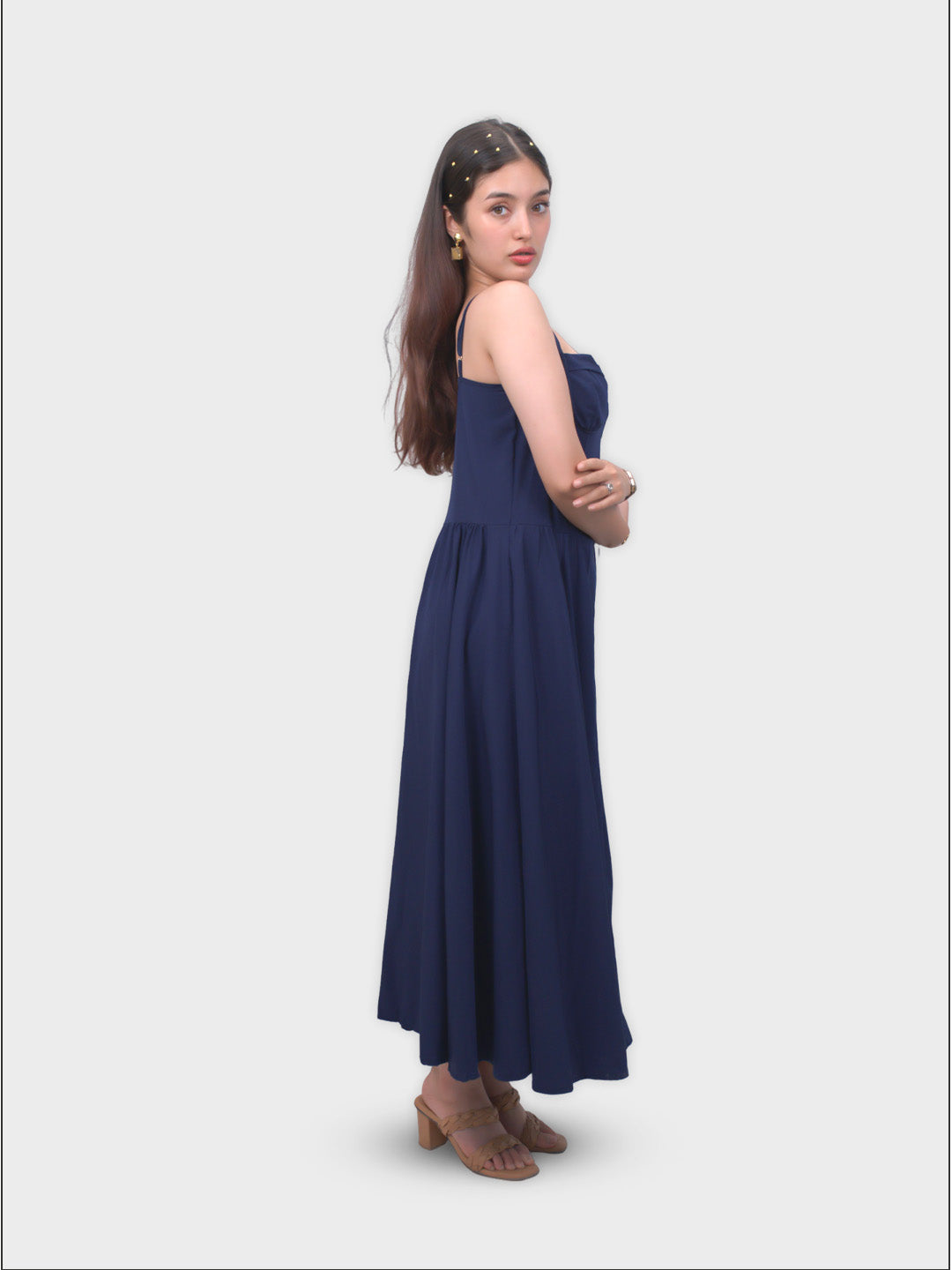 Woman wearing a navy blue dress