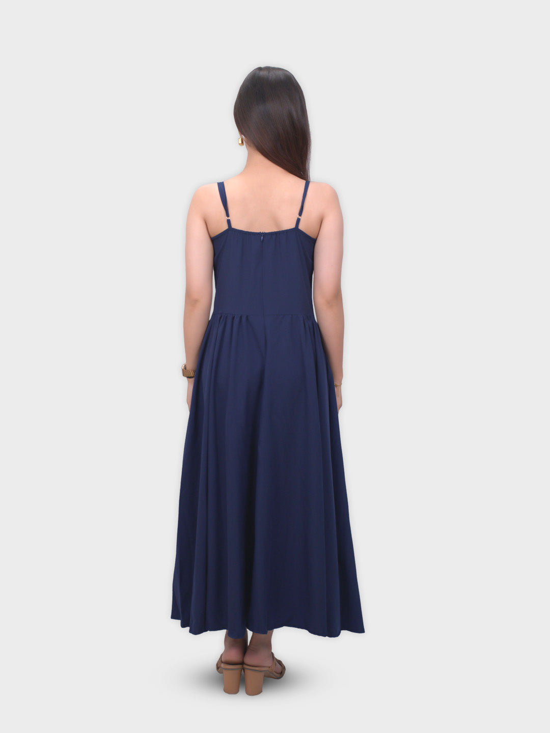 Woman wearing a navy blue dress