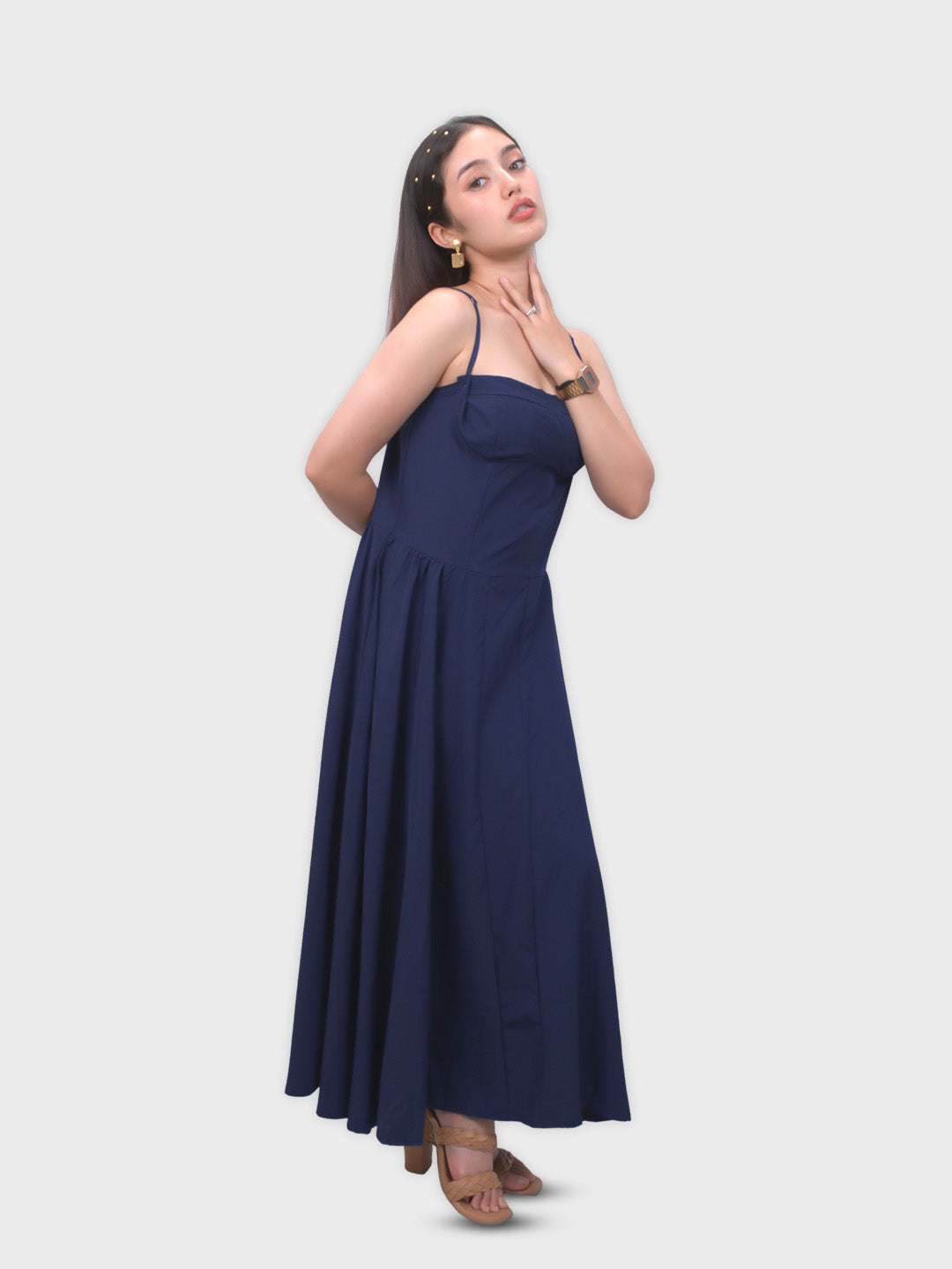 Woman wearing a navy blue dress
