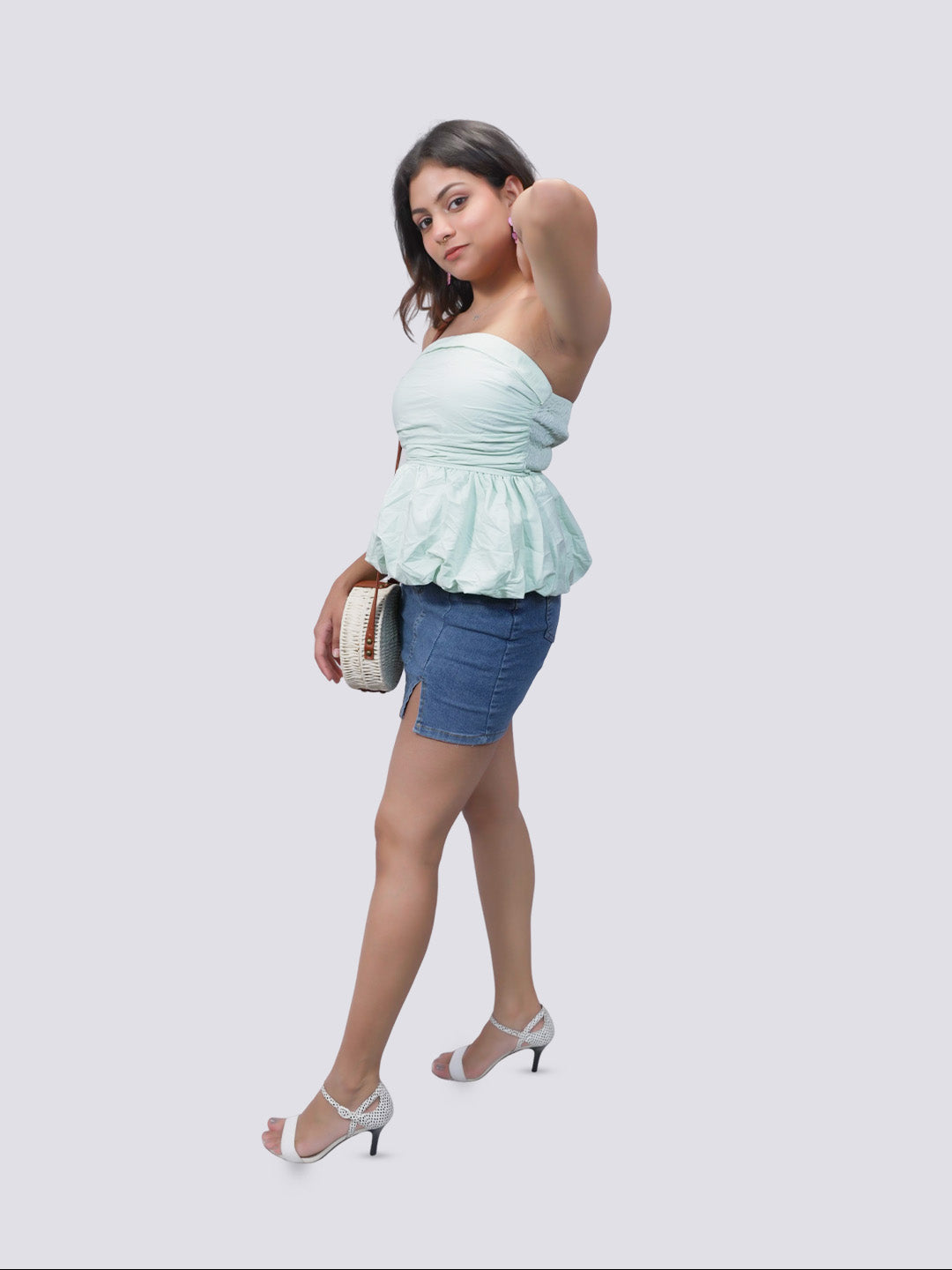 A mint green stapless ruffled top