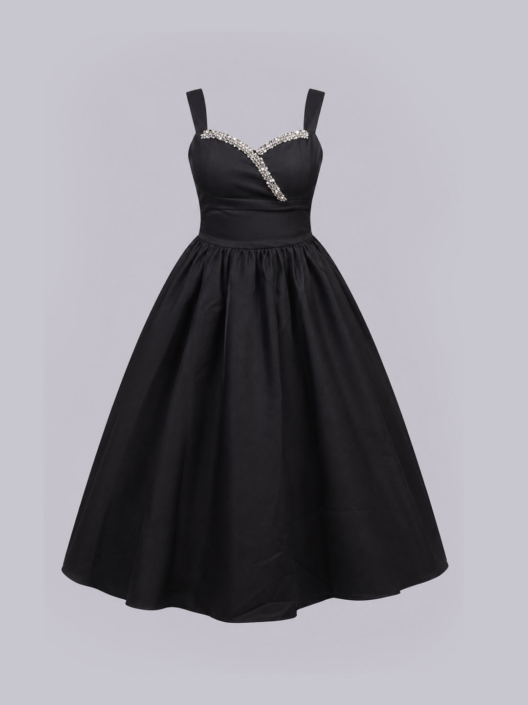 A black swing-style cocktail dress with a sweetheart neckline.