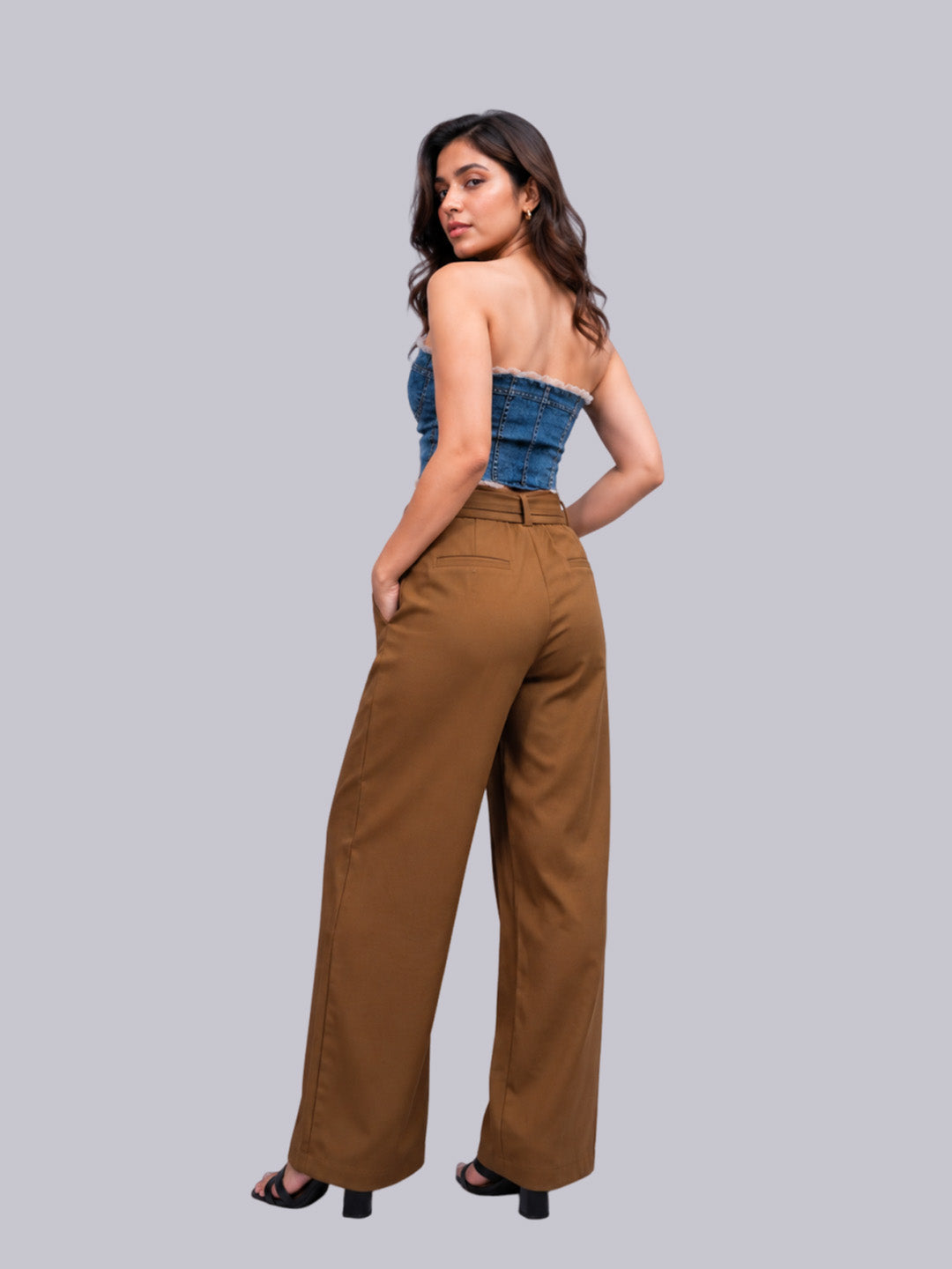 A beige pleated trousers back and camel color design