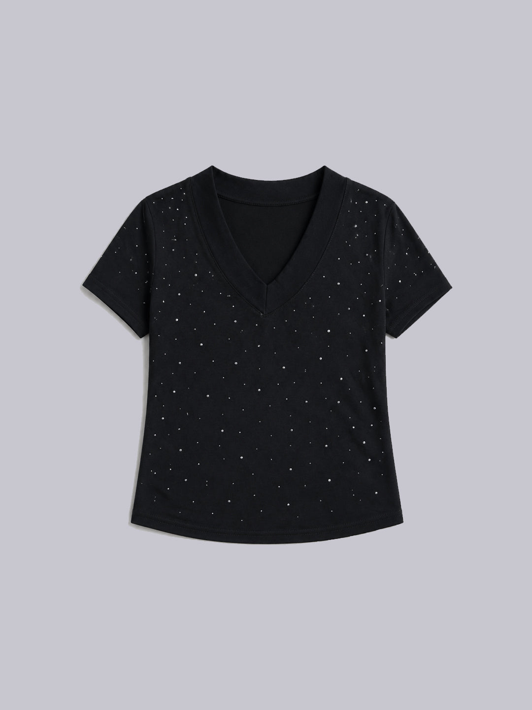 A black short-sleeve V-neck top with a scattered small white dot pattern.