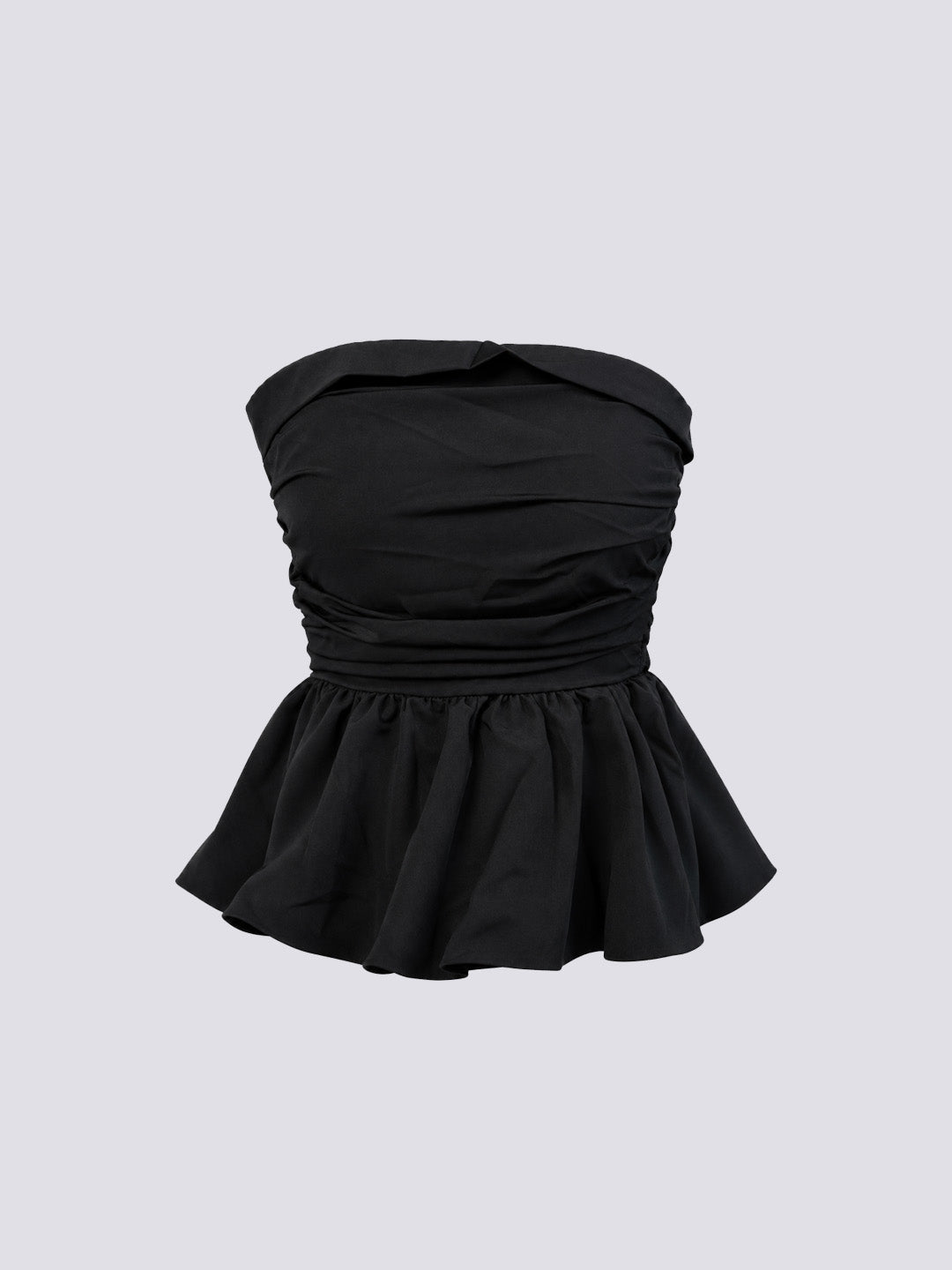 A black strapless peplum top with a ruched bodice and flared skirt.