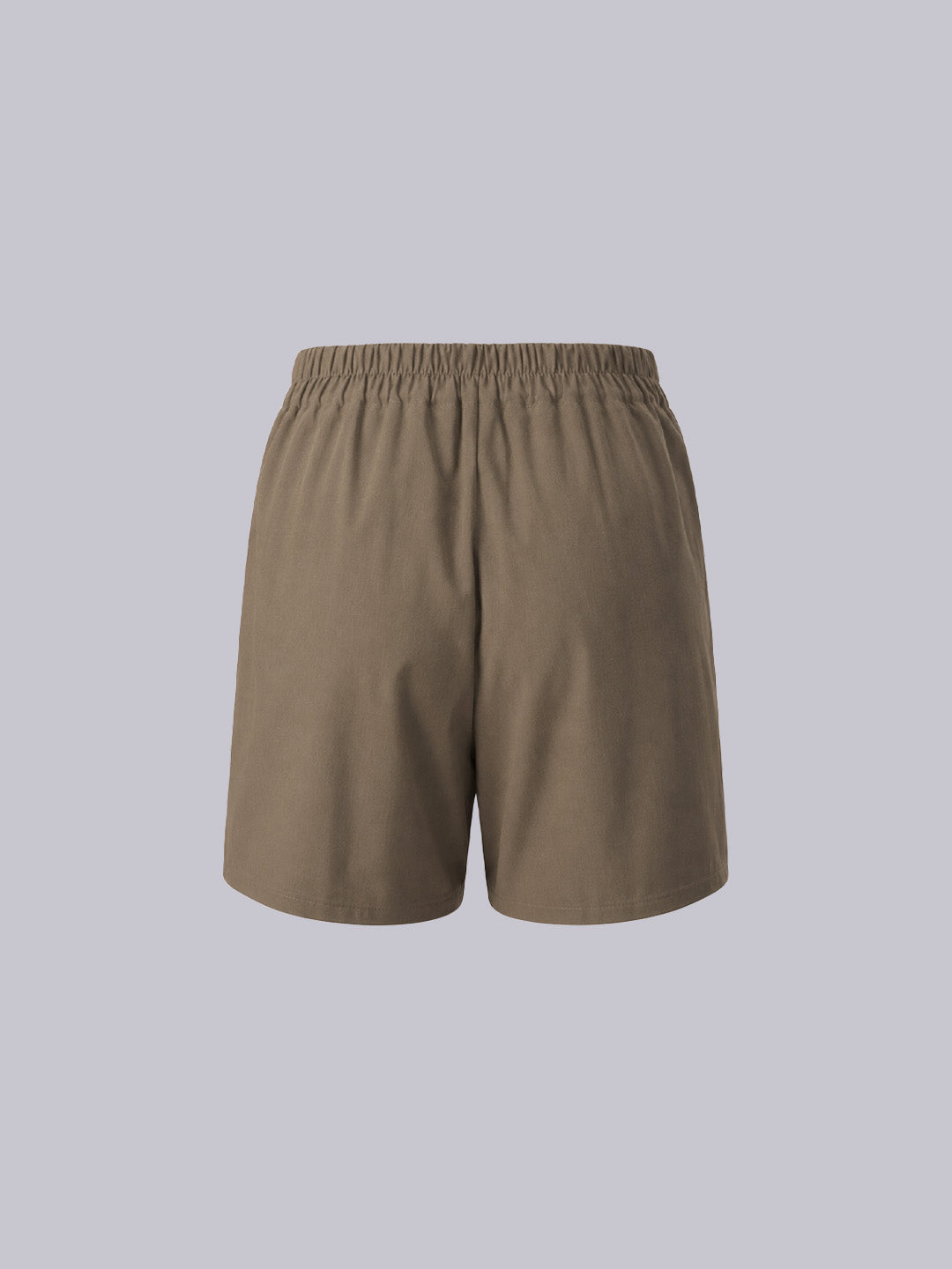 A pair of khaki-colored athletic shorts with an elastic waistband.
