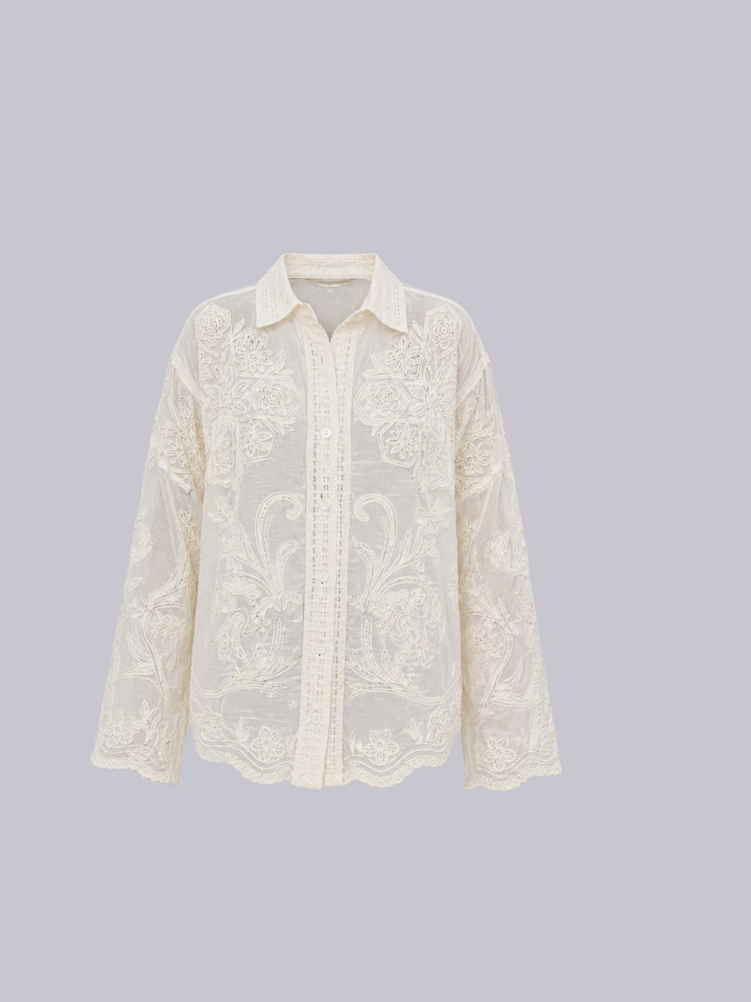 An off-white lace long-sleeve button-up shirt.