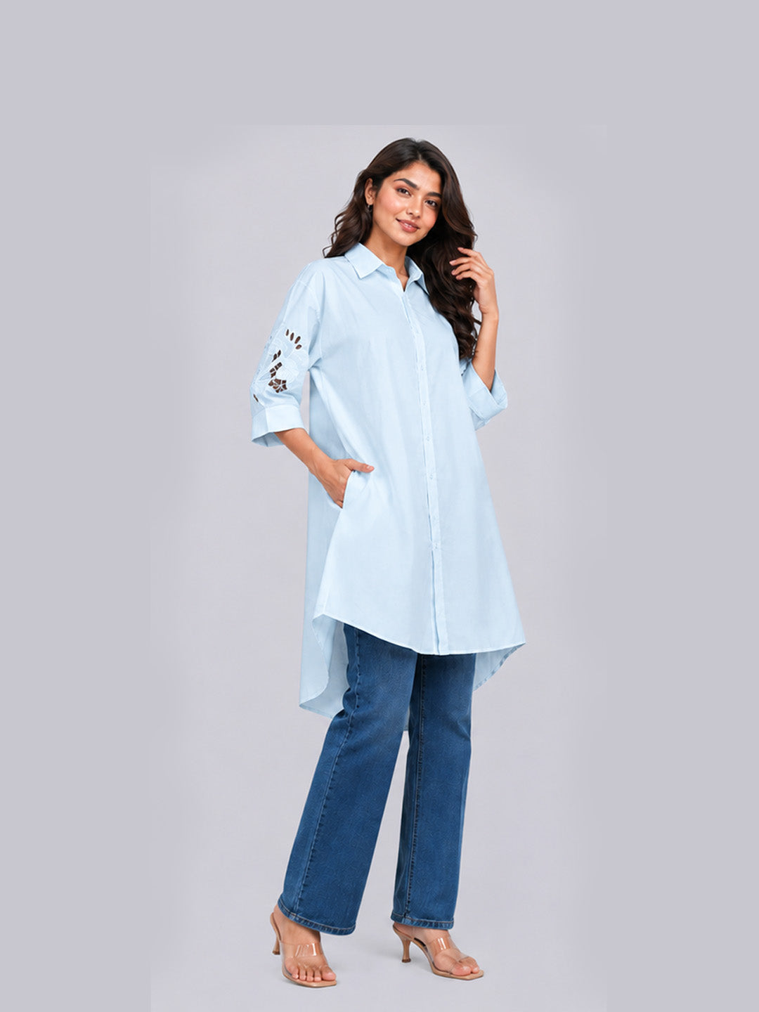 A light blue high-low button-up shirt