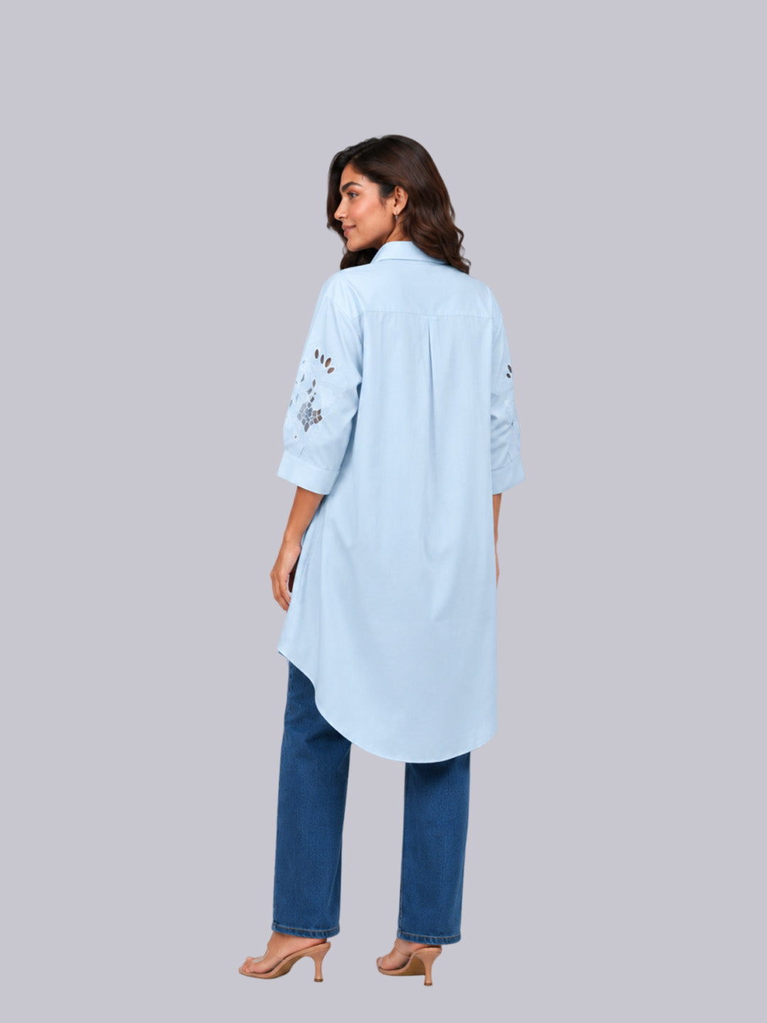 A light blue long kurta with embroidered details on the sleeves