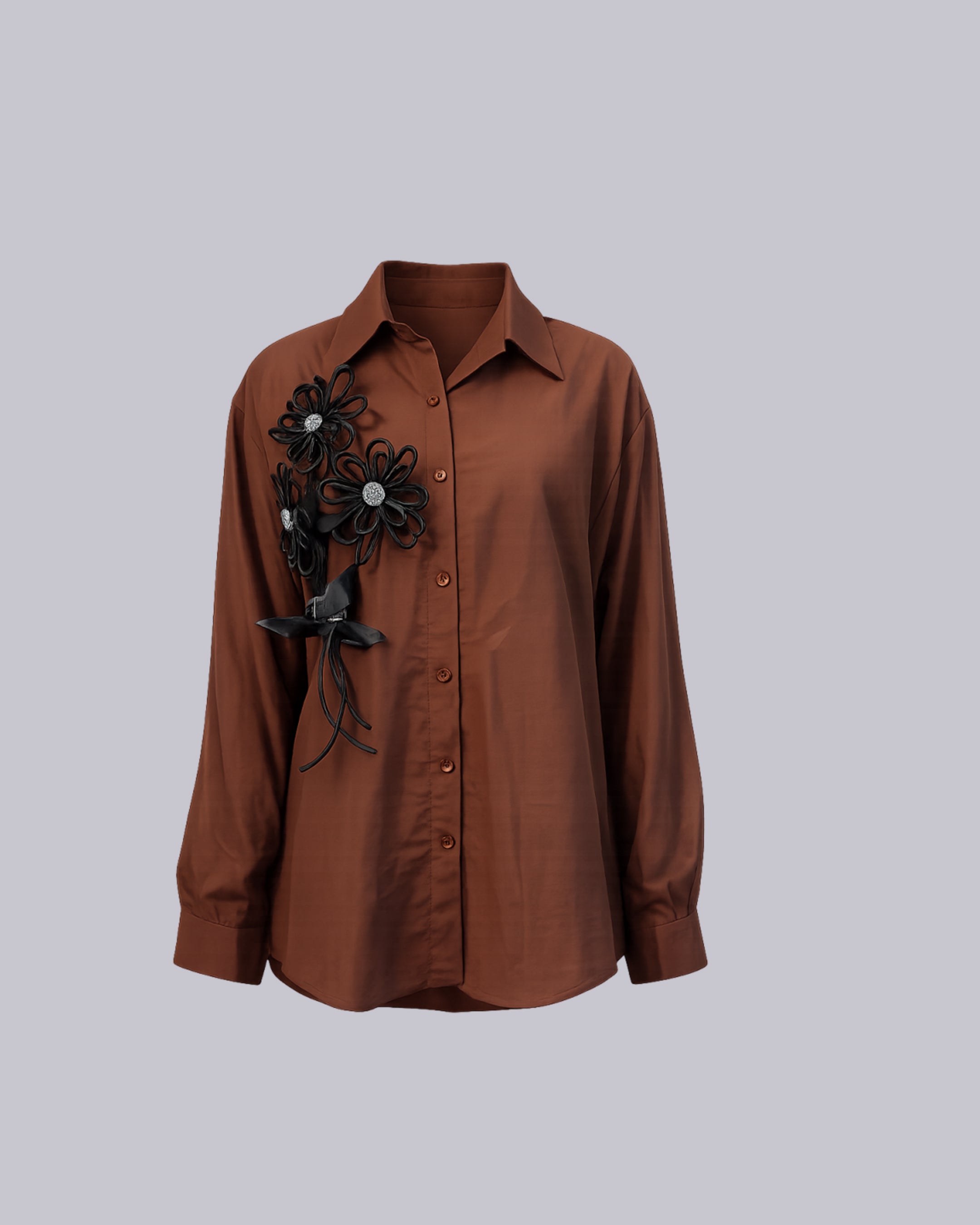 A brown long-sleeve button-up shirt 