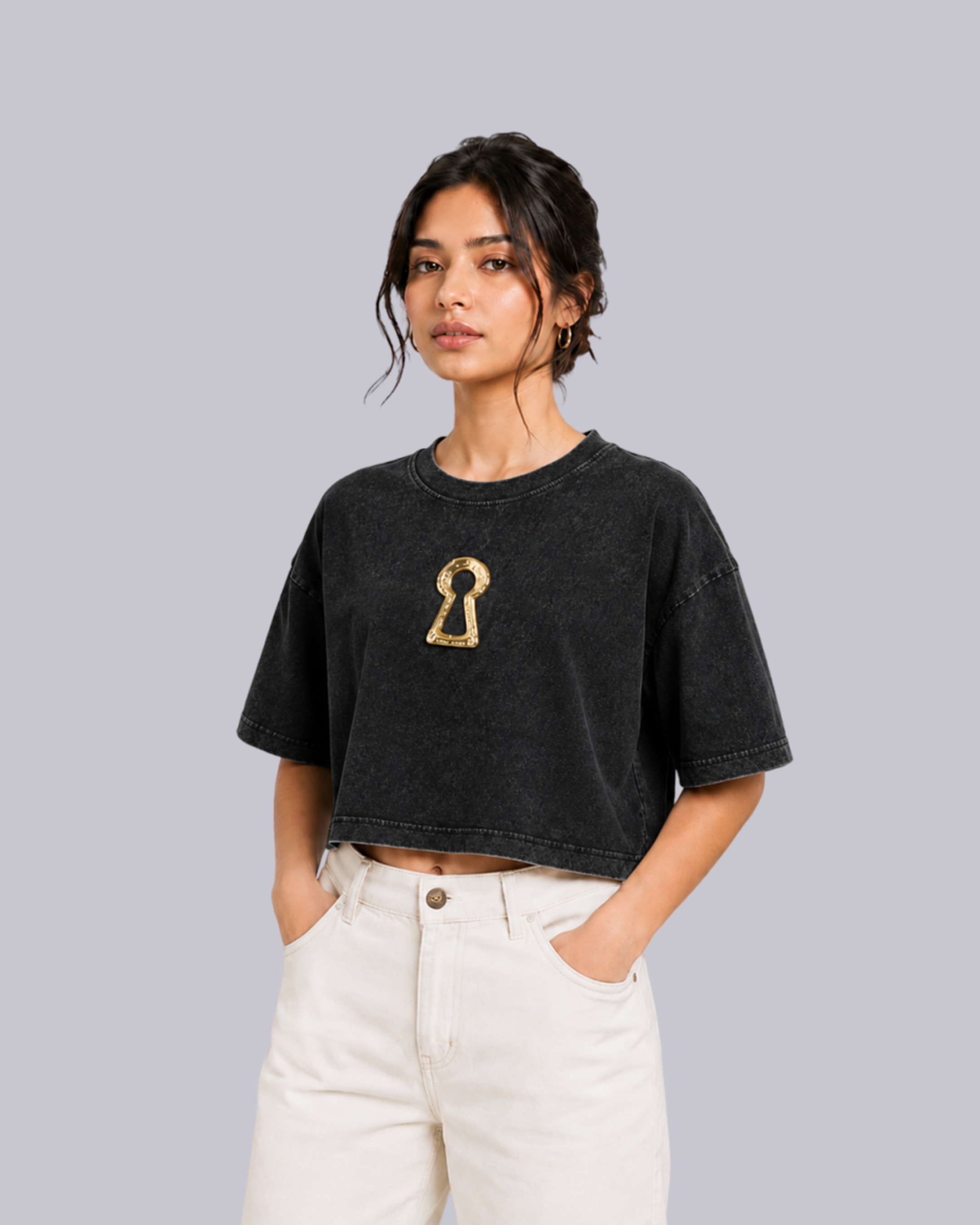 A cropped black acid-wash t-shirt