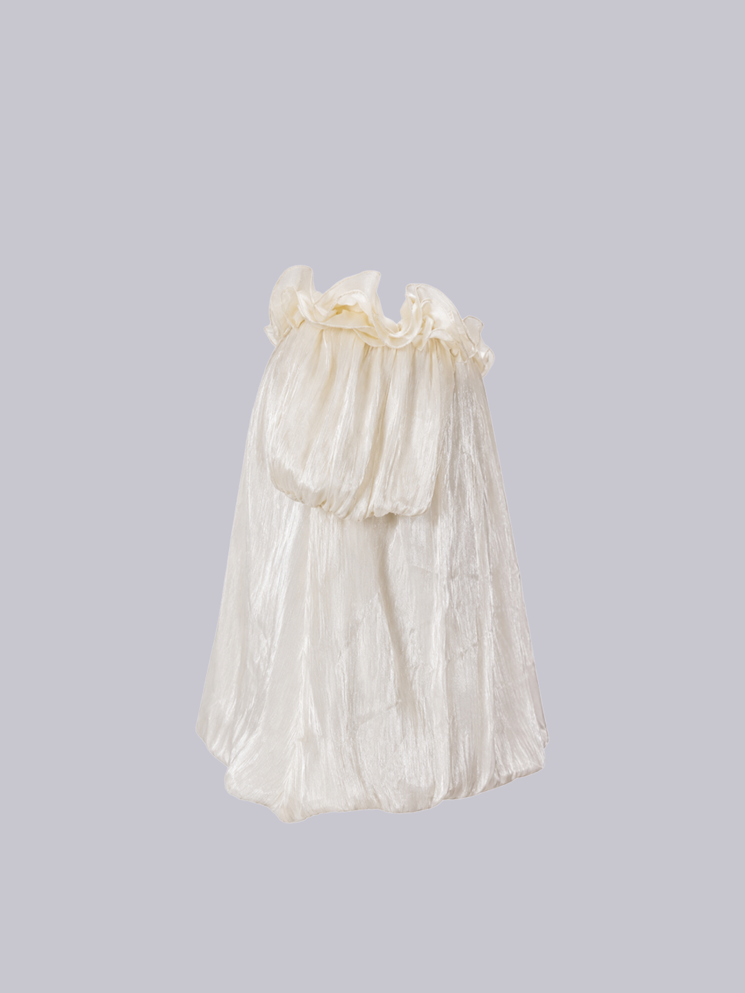 An off-the-shoulder cream-colored dress with a crinkled, textured fabric and a ruffled collar.