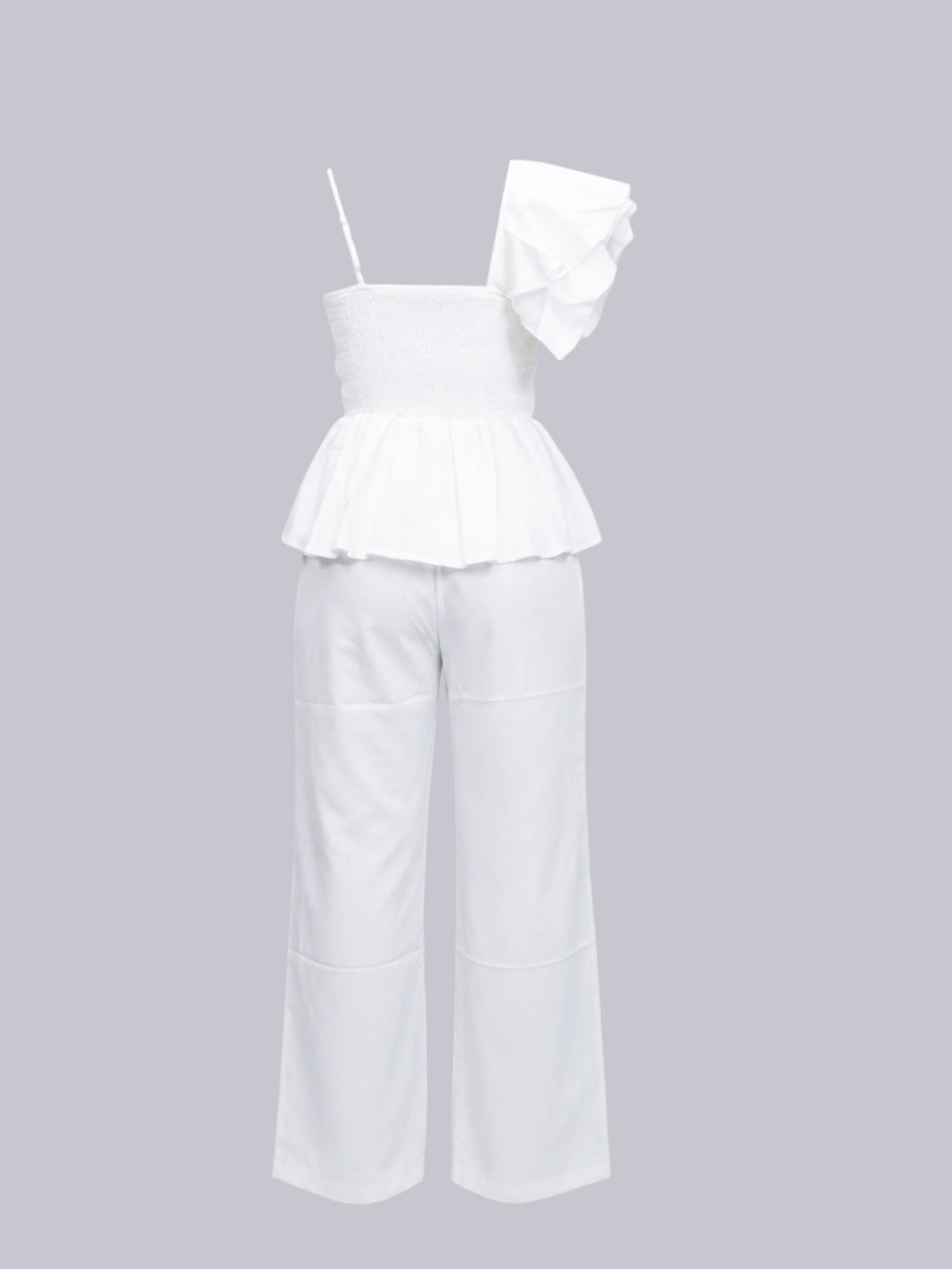 A sleeveless top with a ruffled shoulder detail