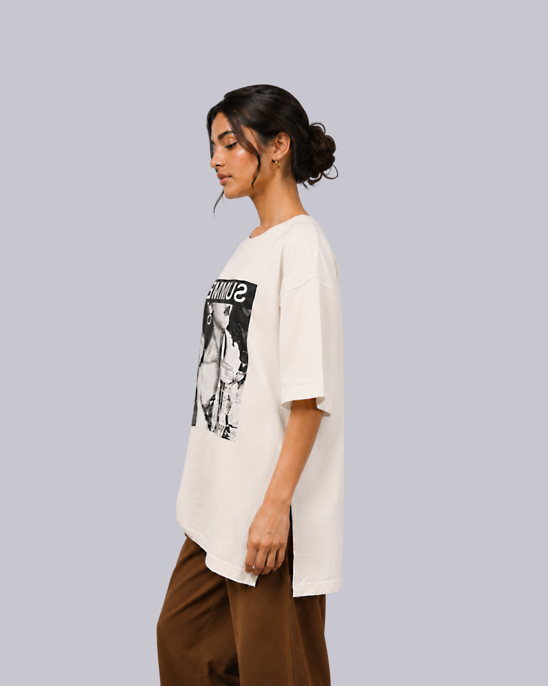 An oversized cream-colored graphic t-shirt