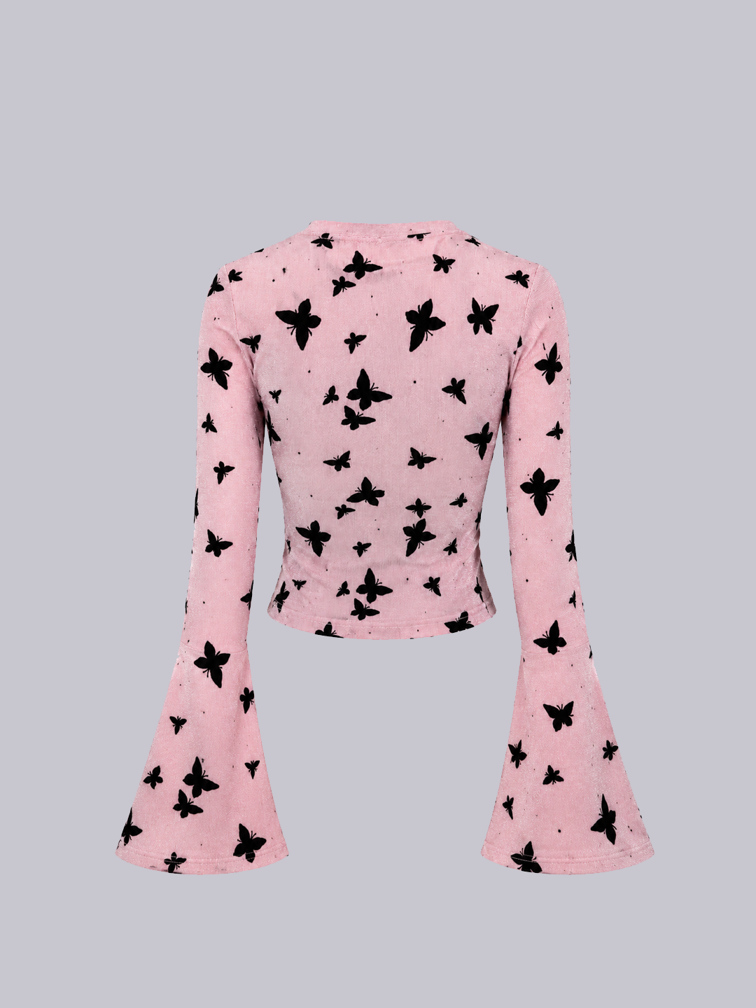 A pink long-sleeve crop top with a black butterfly print.
