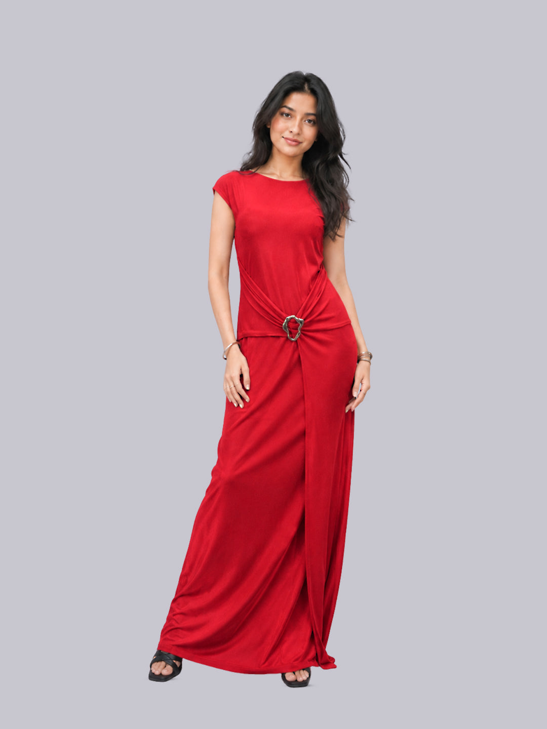 A long red maxi dress with cap sleeves, a gathered waist