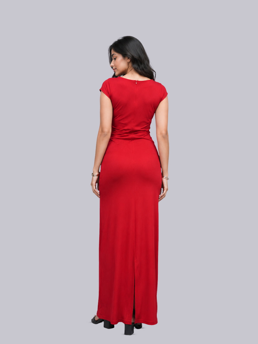 A bright red floor-length maxi dress with cap sleeves, shown from the back 