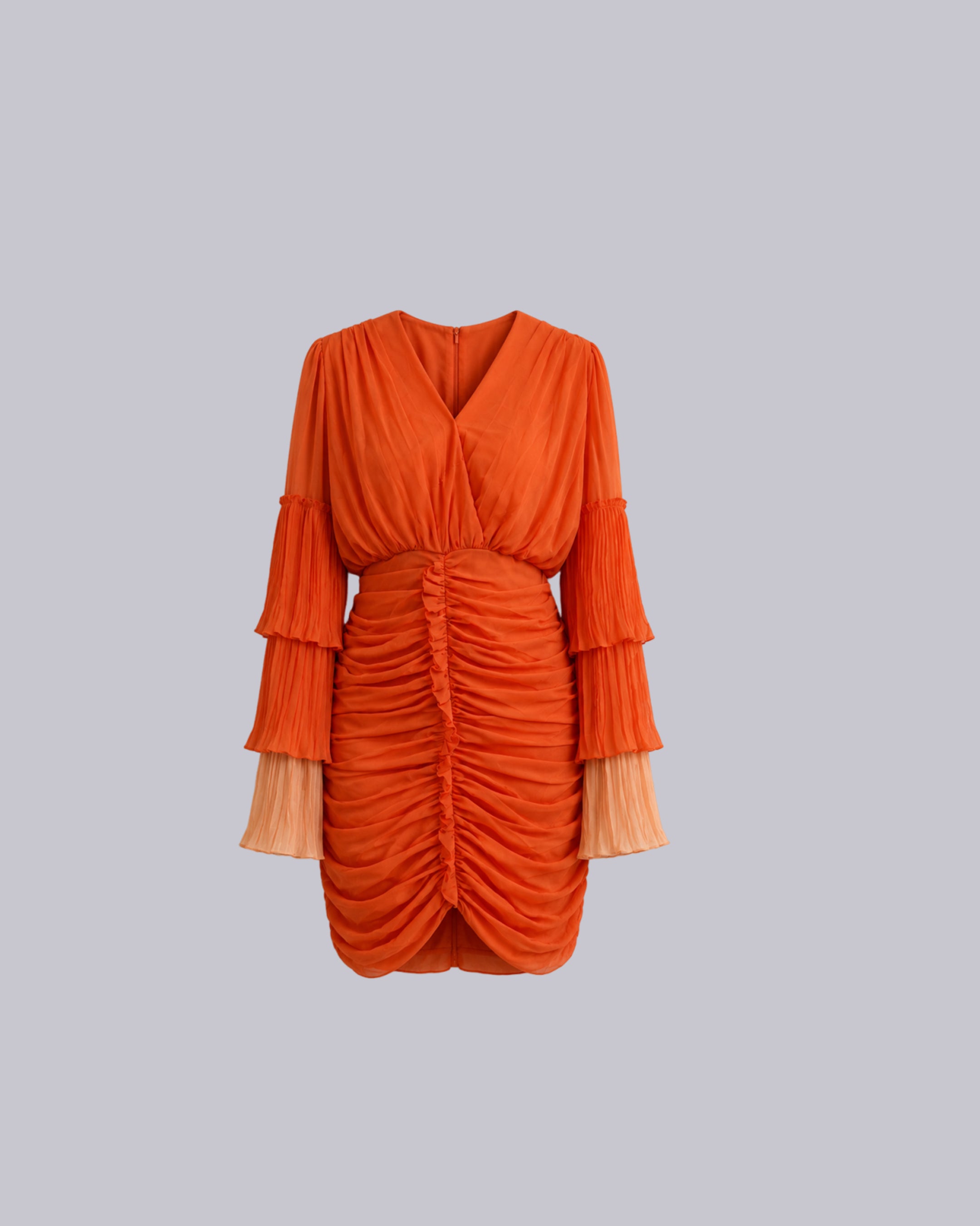 An orange draped mini dress.
