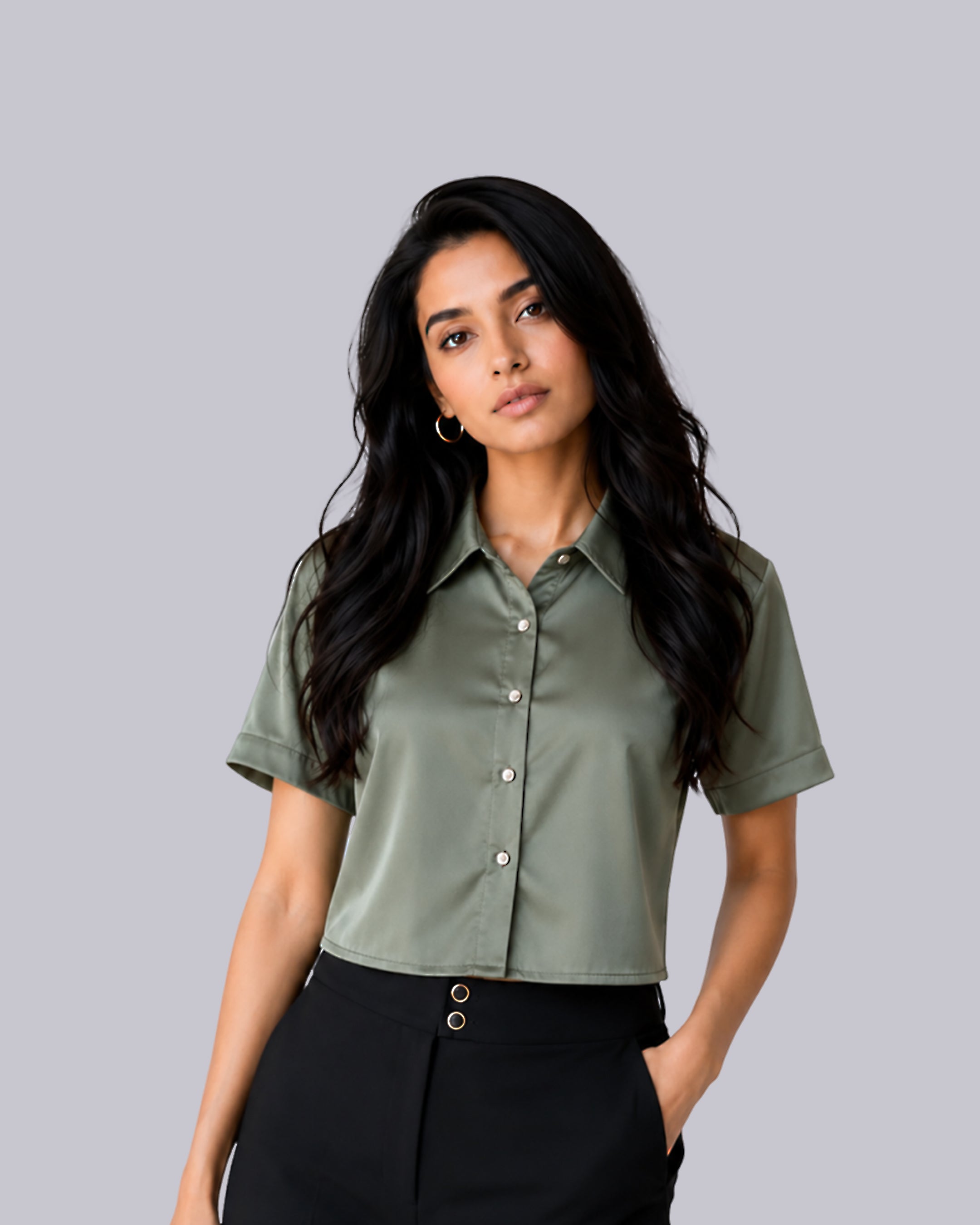A woman modeling a short-sleeve button-up shirt