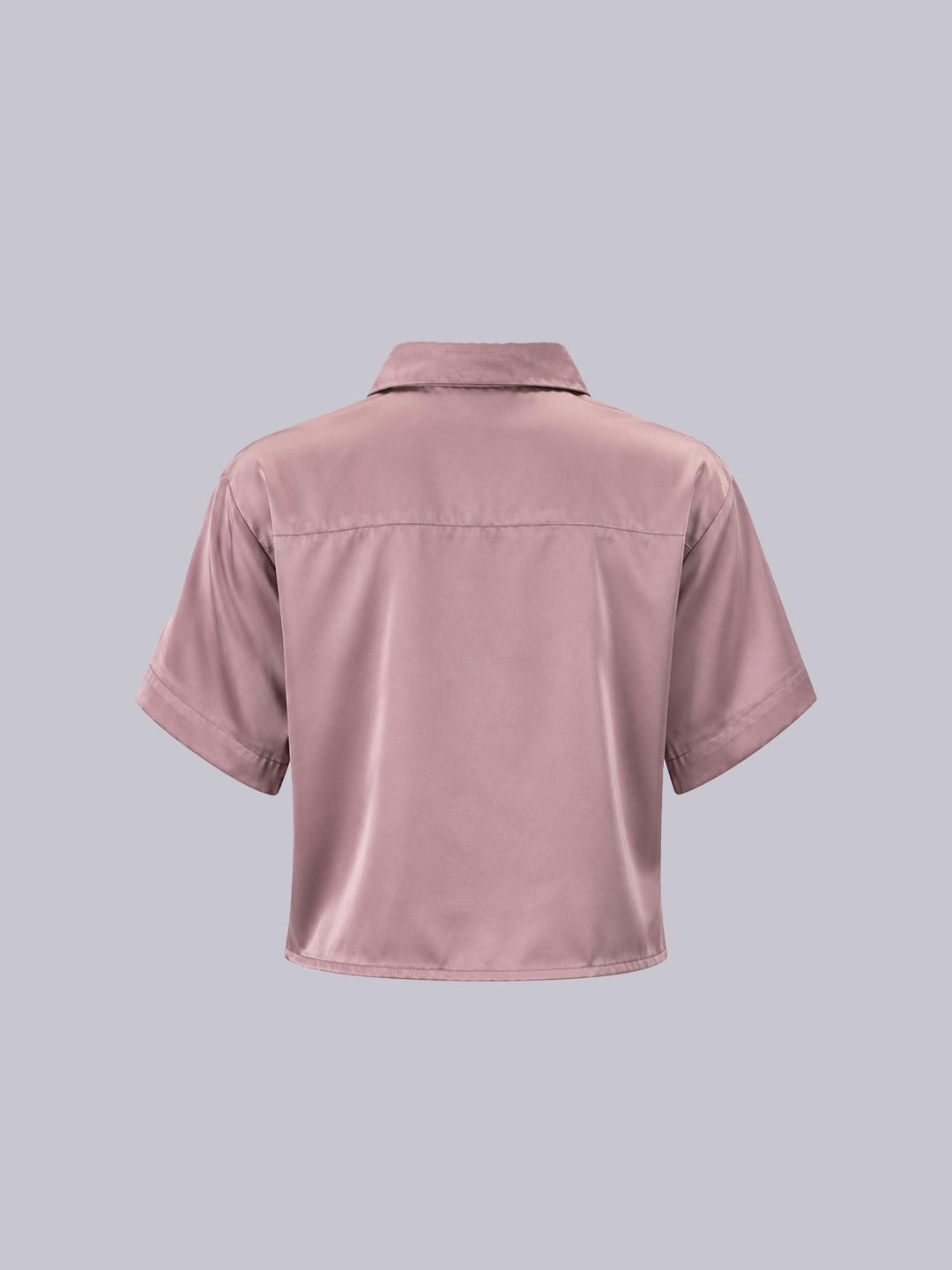 A short-sleeve collared shirt shown from the back, in a dusty rose pink color.