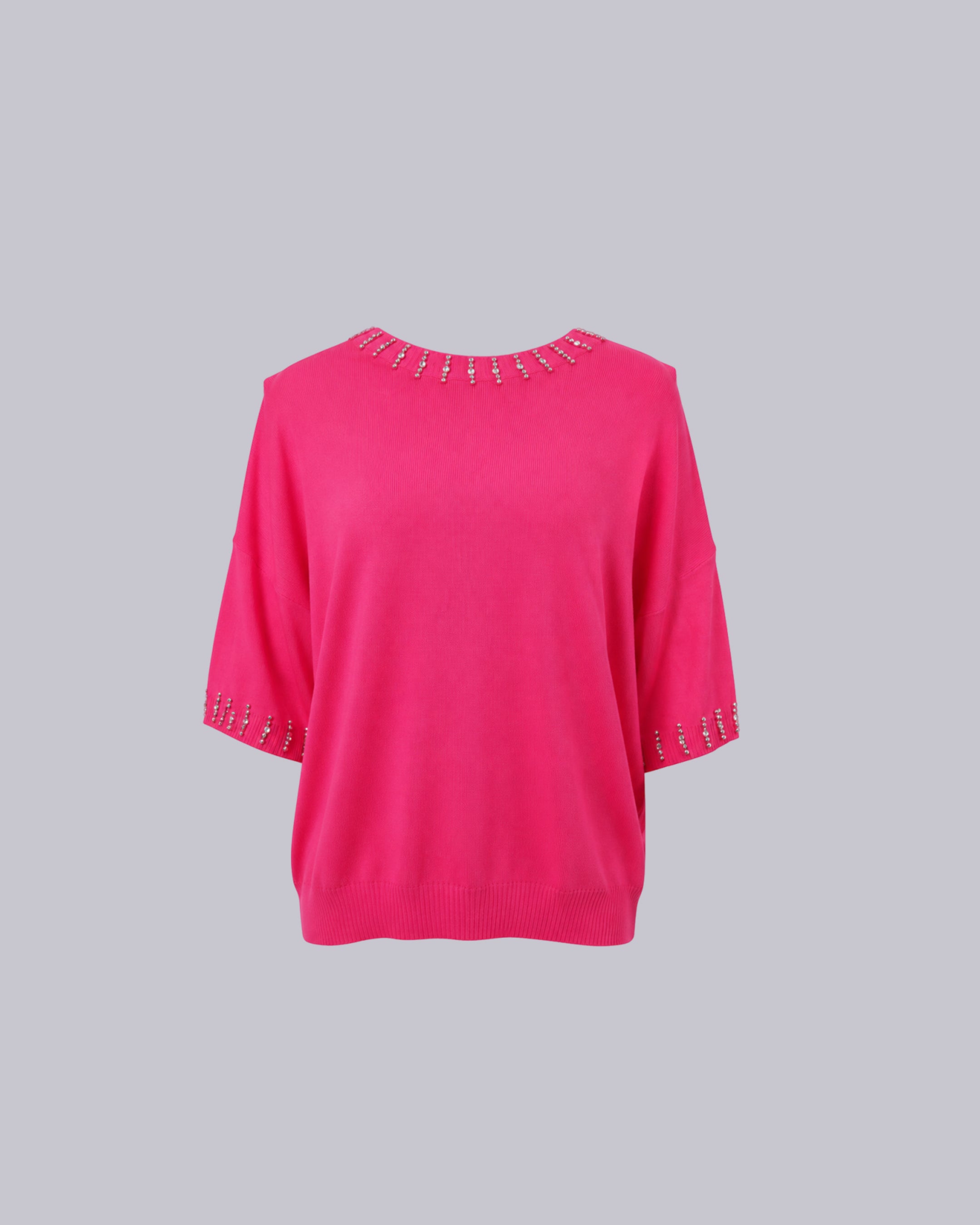 A bright pink knit top 