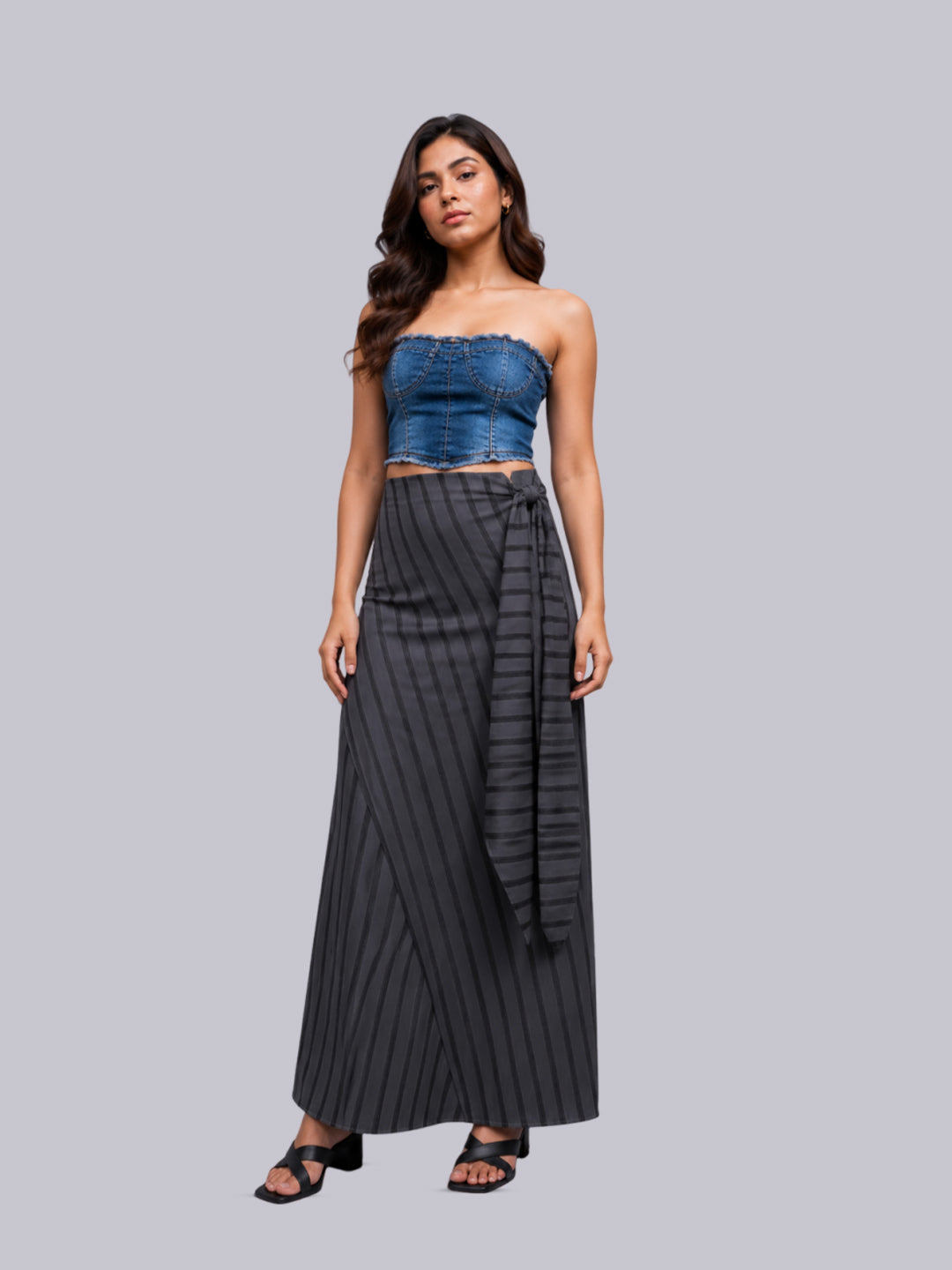 A dark gray pinstriped maxi skirt