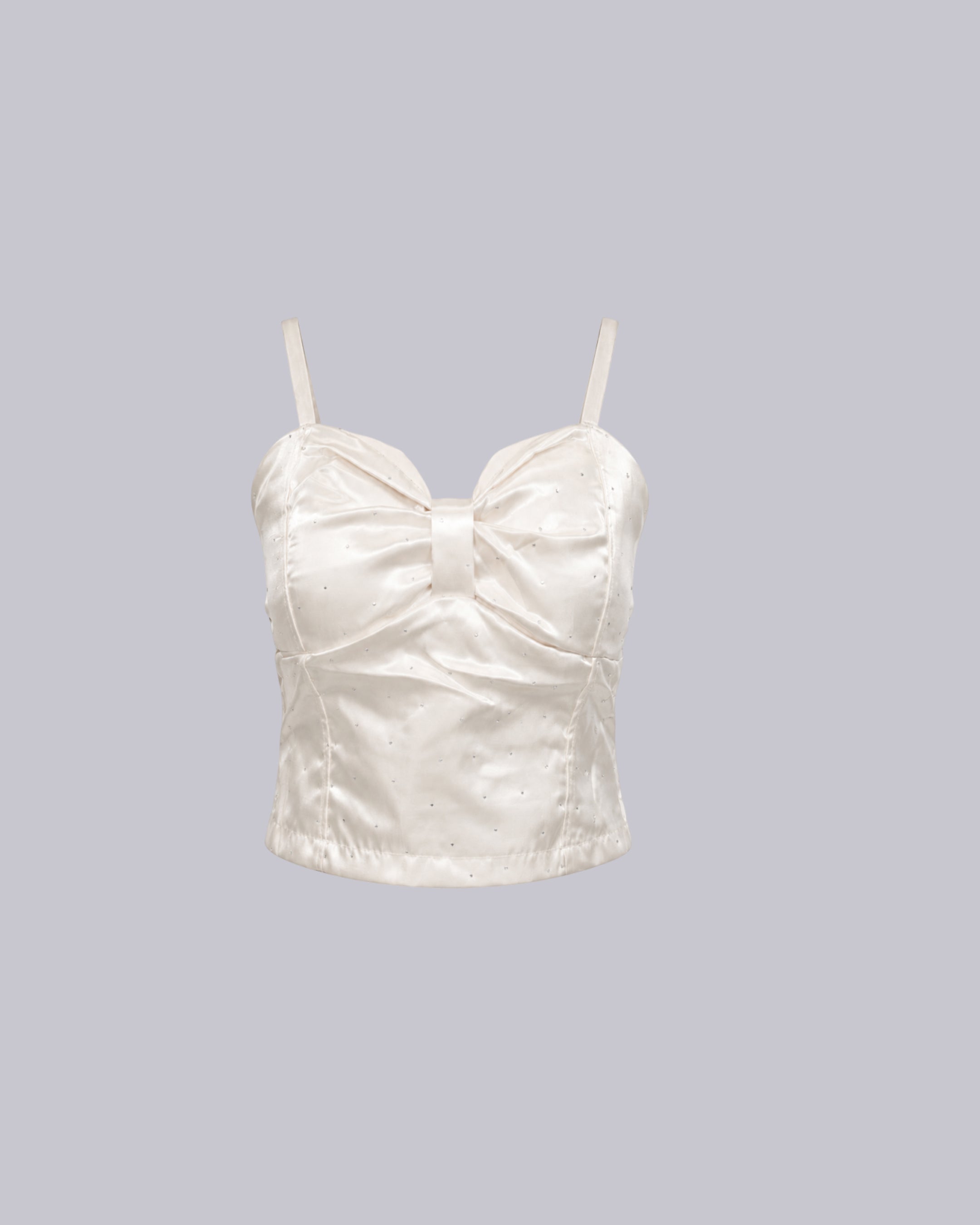 An ivory satin bustier-style camisole top