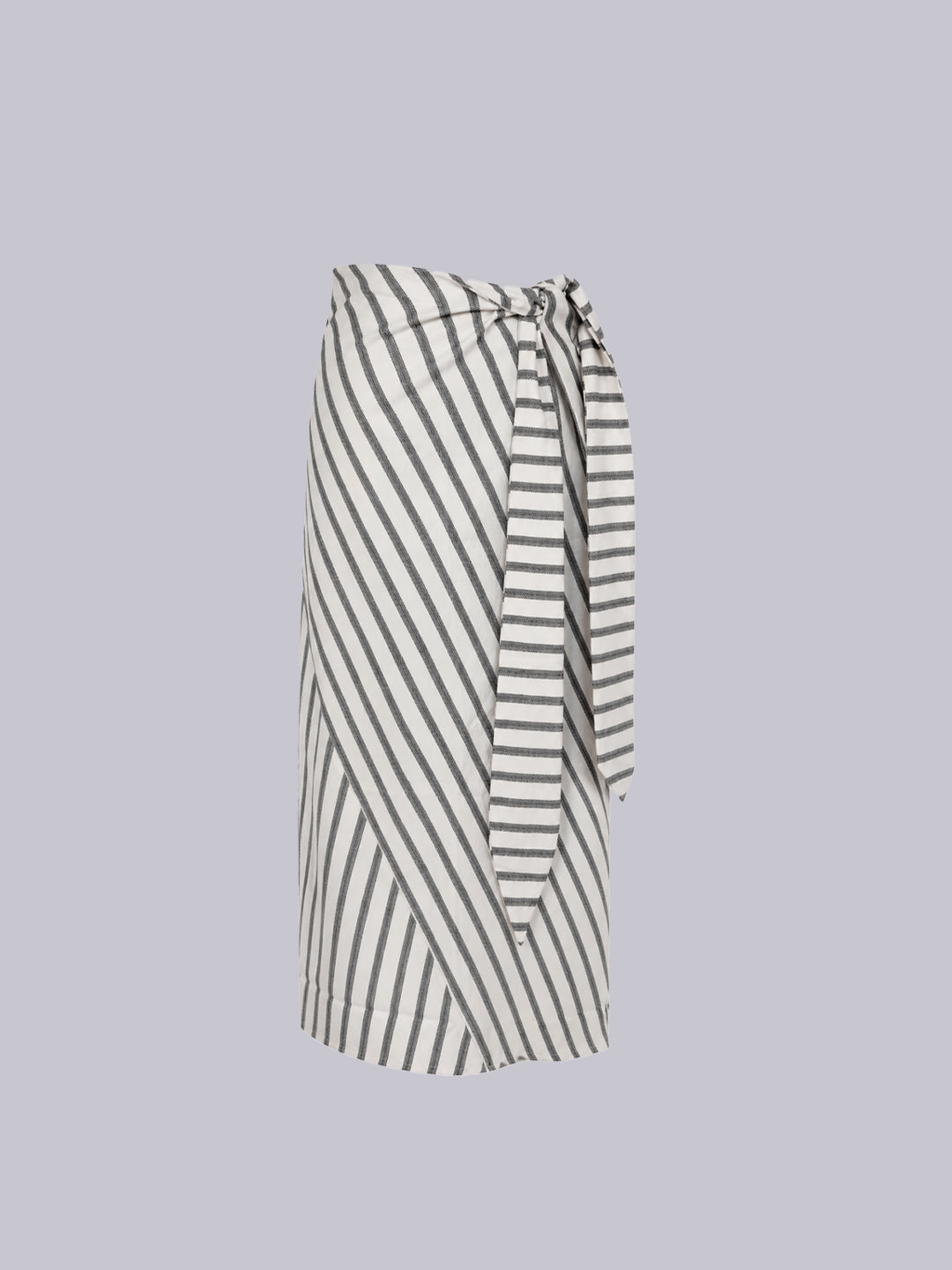 A wrap-style midi skirt with diagonal black stripes on a white base.