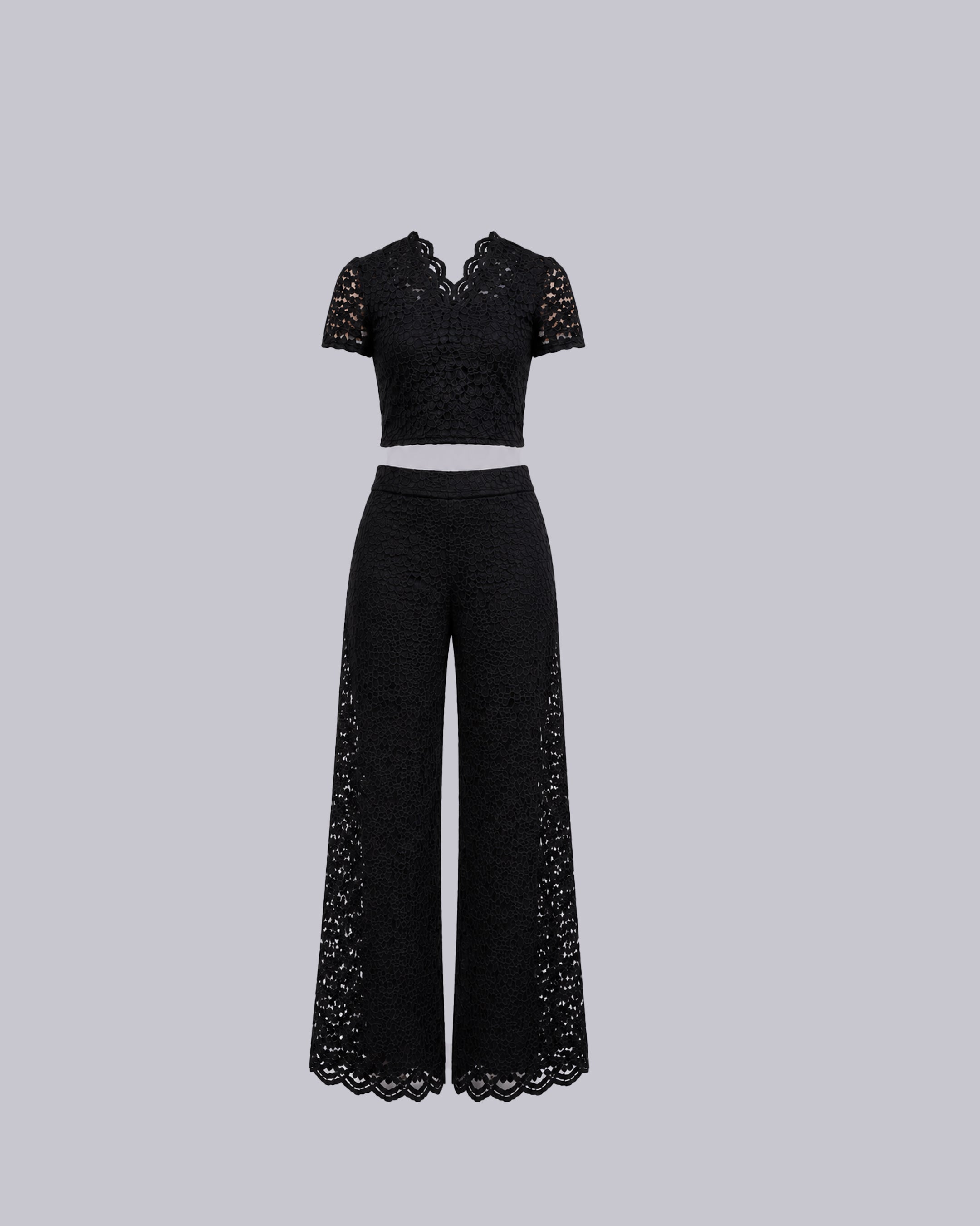 A black two-piece lace outfit featuring a short-sleeve cropped top.