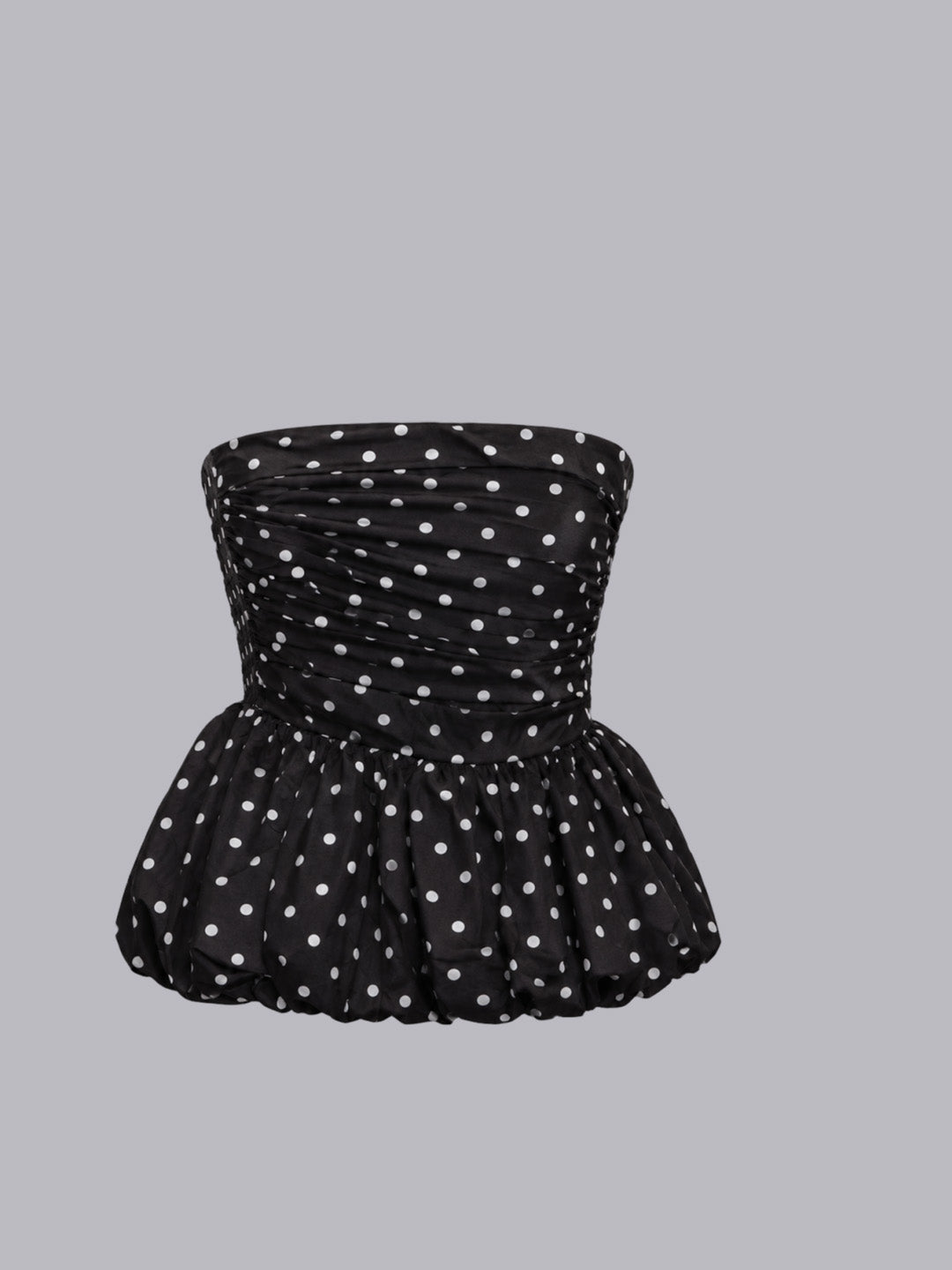 A black strapless peplum top.