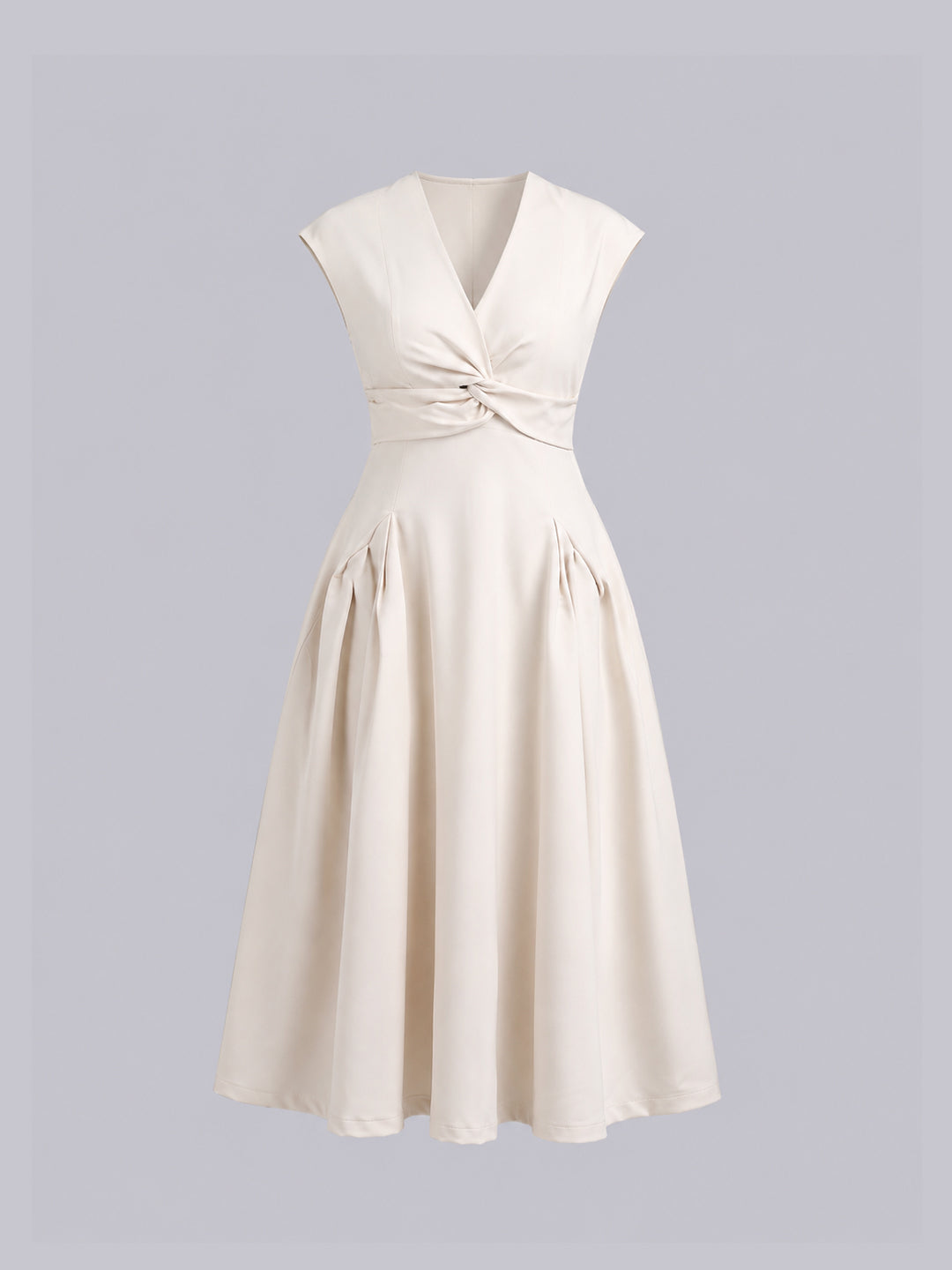 An off-white sleeveless V-neck dress with a twisted waist detail and a flared skirt, shown against a solid gray background.