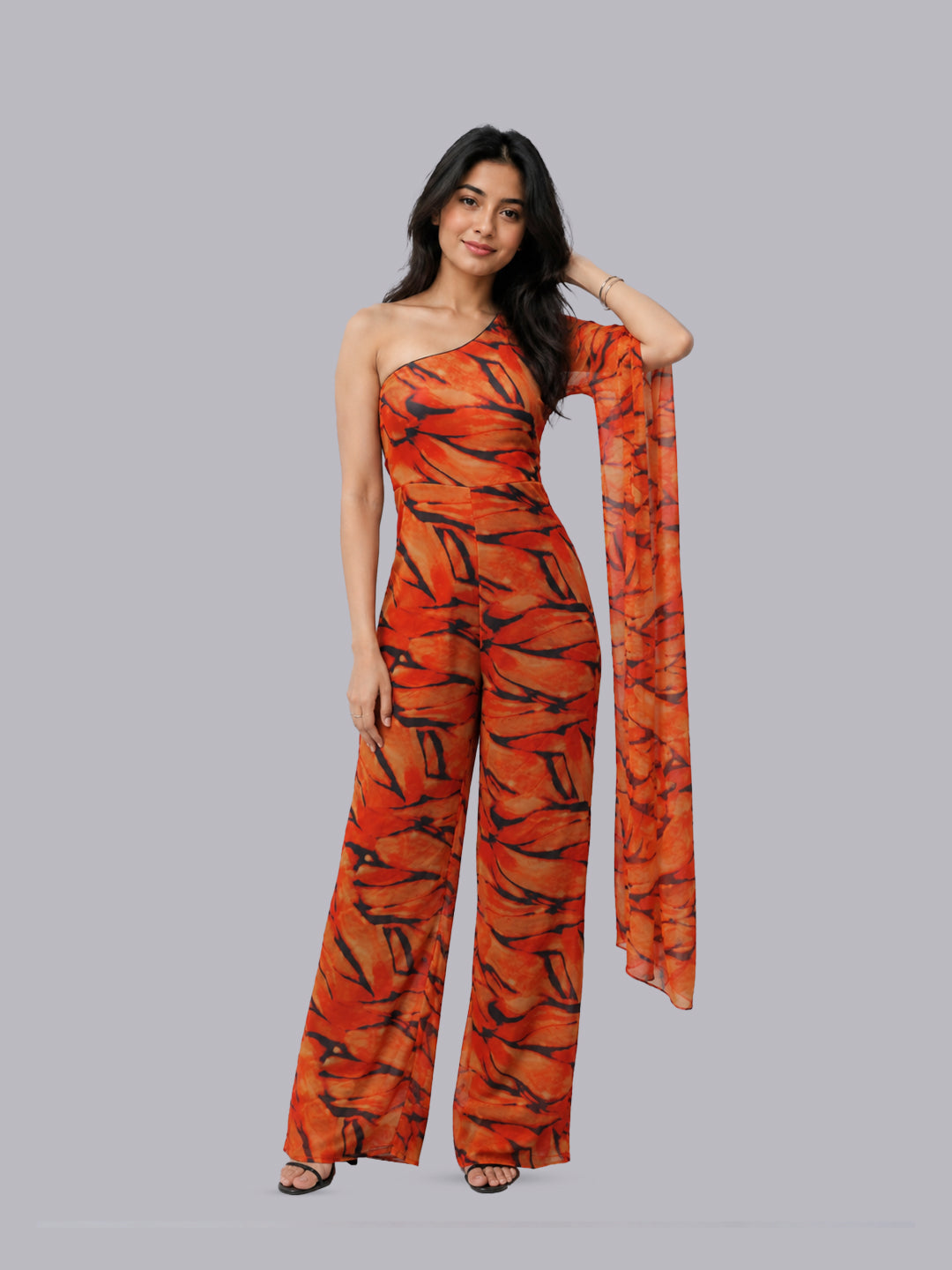 A one-shoulder orange jumpsuit.