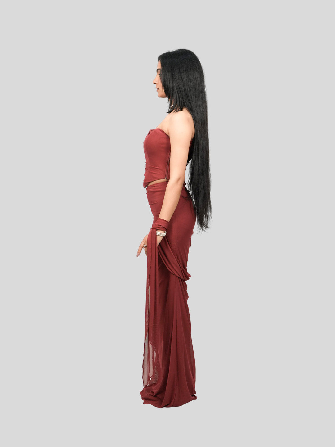 Woman wearing a burgundy evening gown