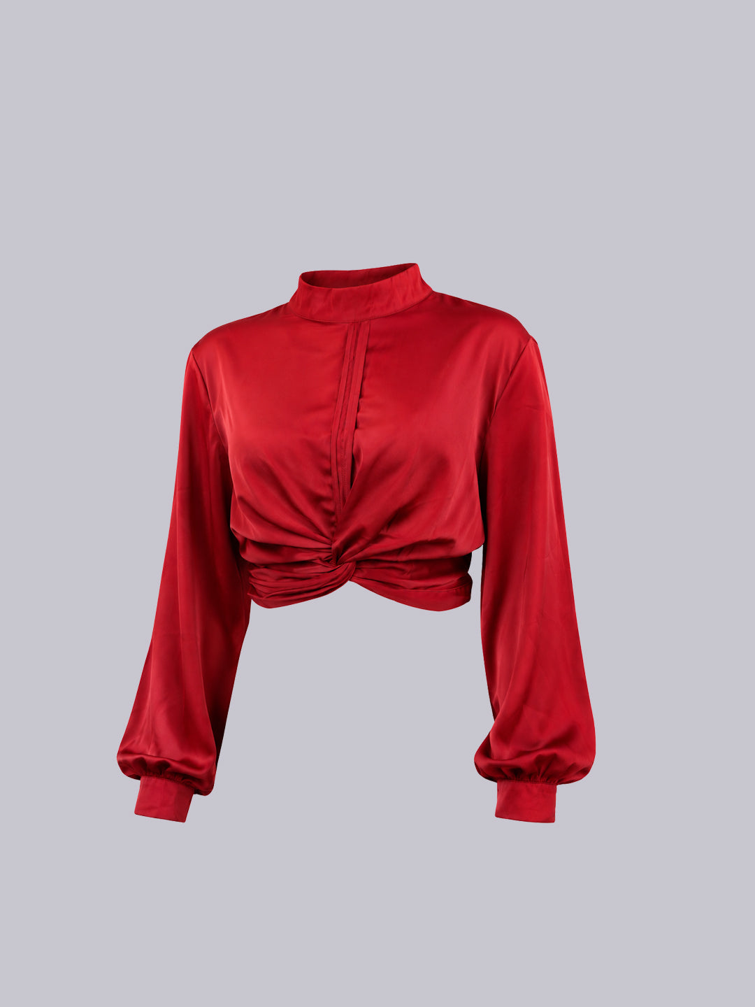 A red long-sleeve mock neck crop top.